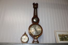 A mahogany cased thermometer / barometer together with a barometer