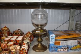 A brass oil lamp