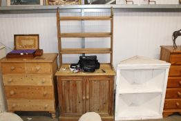 A pine dresser raised on cupboard base