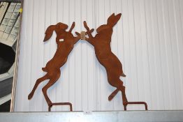 A garden stake in the form of fighting hares (2)