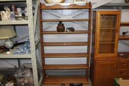 A pine bookcase, vendor reports purchased from Joy