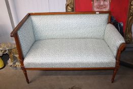 A reproduction salon settee