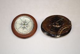 Two reproduction compasses
