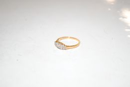 An 18ct gold diamond set ring, ring size J, approx