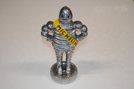 A reproduction advertising figure in the form of a