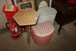 Two Lloyd loom linen baskets and a cane hexagonal