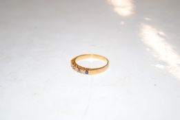 An 18ct gold sapphire and diamond set ring, ring s