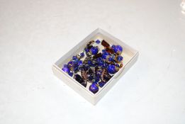 A vintage two strand blue and gold Murano glass be