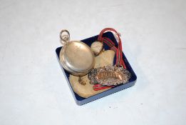 A military marked compass, a silver port decanter