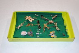 Approximately thirty mainly enamel decorated brooc