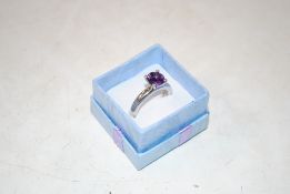 A sterling silver amethyst set solitaire ring, siz