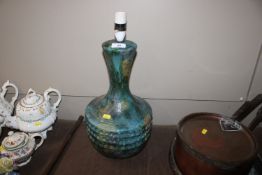 A blue continental pottery table lamp