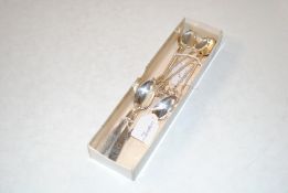 Four International coffee spoons and six Indian wh