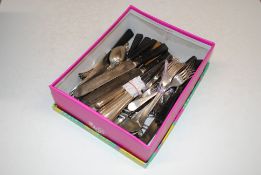 A box containing various silver plated cutlery to