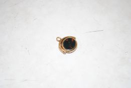 A yellow metal swivel seal