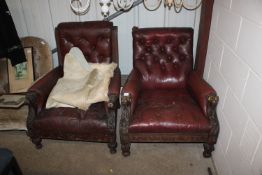 Two leather upholstered deep seated armchairs with carved lion mask decoration AF
