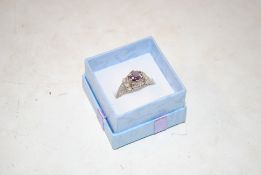 A vintage sterling silver opal and amethyst set ri