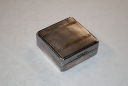 A silver cigarette box, with presentation inscript