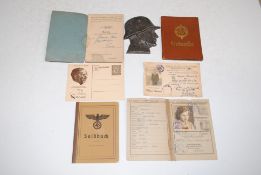 A German WWII ID book, ephemera and the bust of a German solider