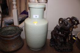A Chinese celadon vase, base drilled