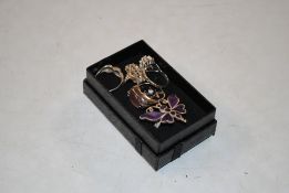 A hallmarked sterling silver sapphire and opal rin