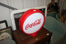A reproduction Coca Cola globe light AF