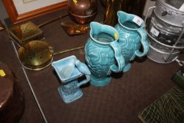A pair of Wade jugs numbered 144 and one other jug