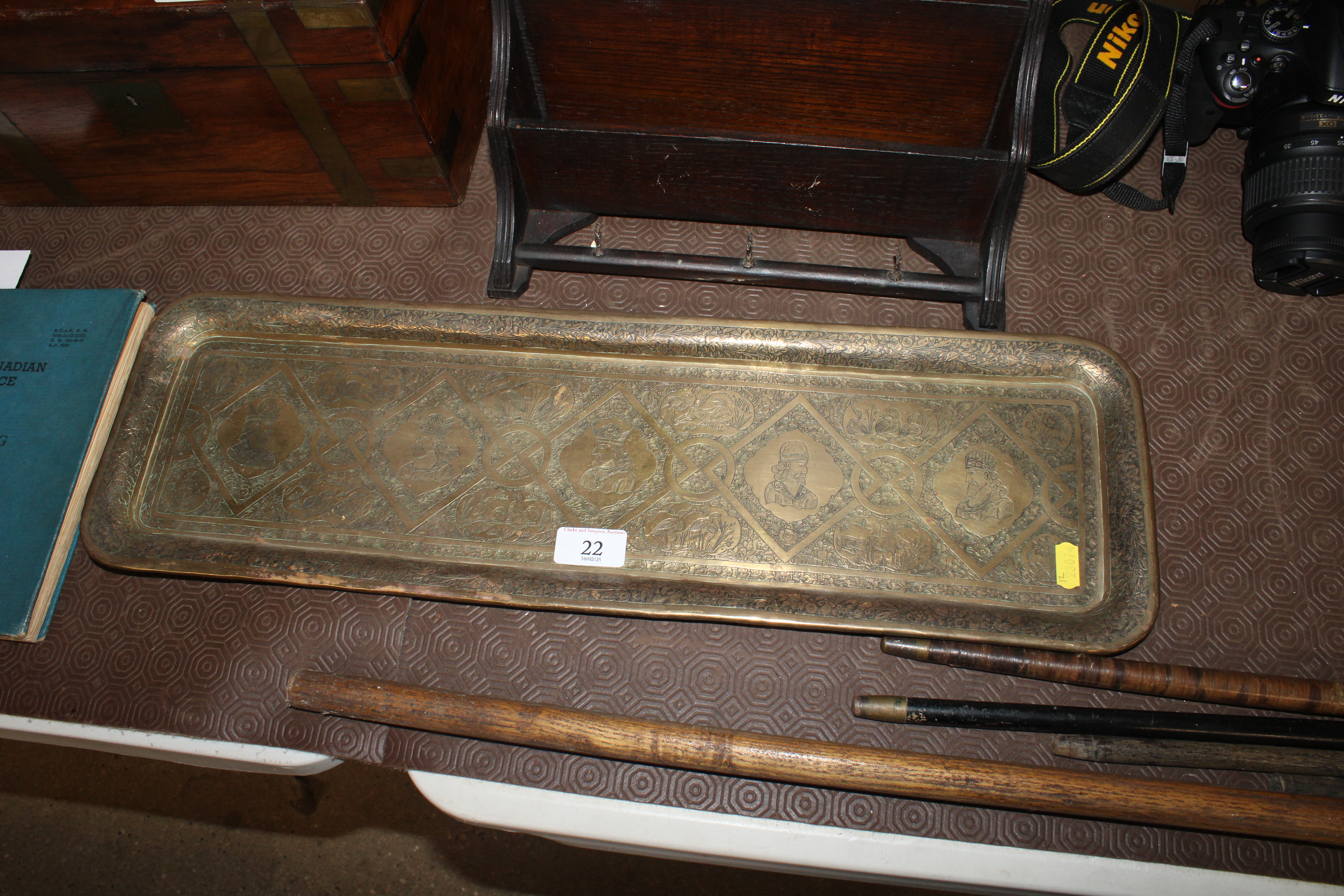 An Islamic brass engraved tray