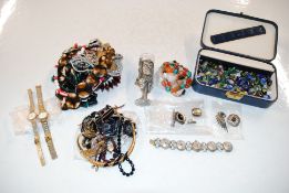 A box of costume jewellery to include bead necklac