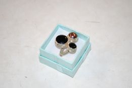 A vintage sterling silver Studio one size ring wit