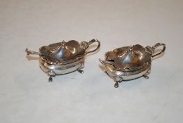 Two silver mustards with spoons, approx. total wei