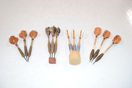 Four sets of vintage darts