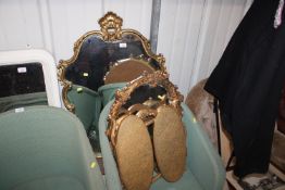 A gilt frame triptych mirror and a decorative framed wall mirror