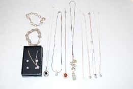 A quantity of mostly gem set sterling silver jewel