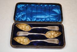 A cased set of three Bright Cut Continental white