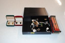 A quantity of dress rings; a box of cufflinks and