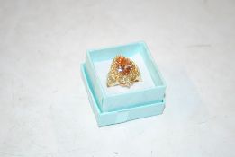 A large gold on sterling silver and padparascha sa