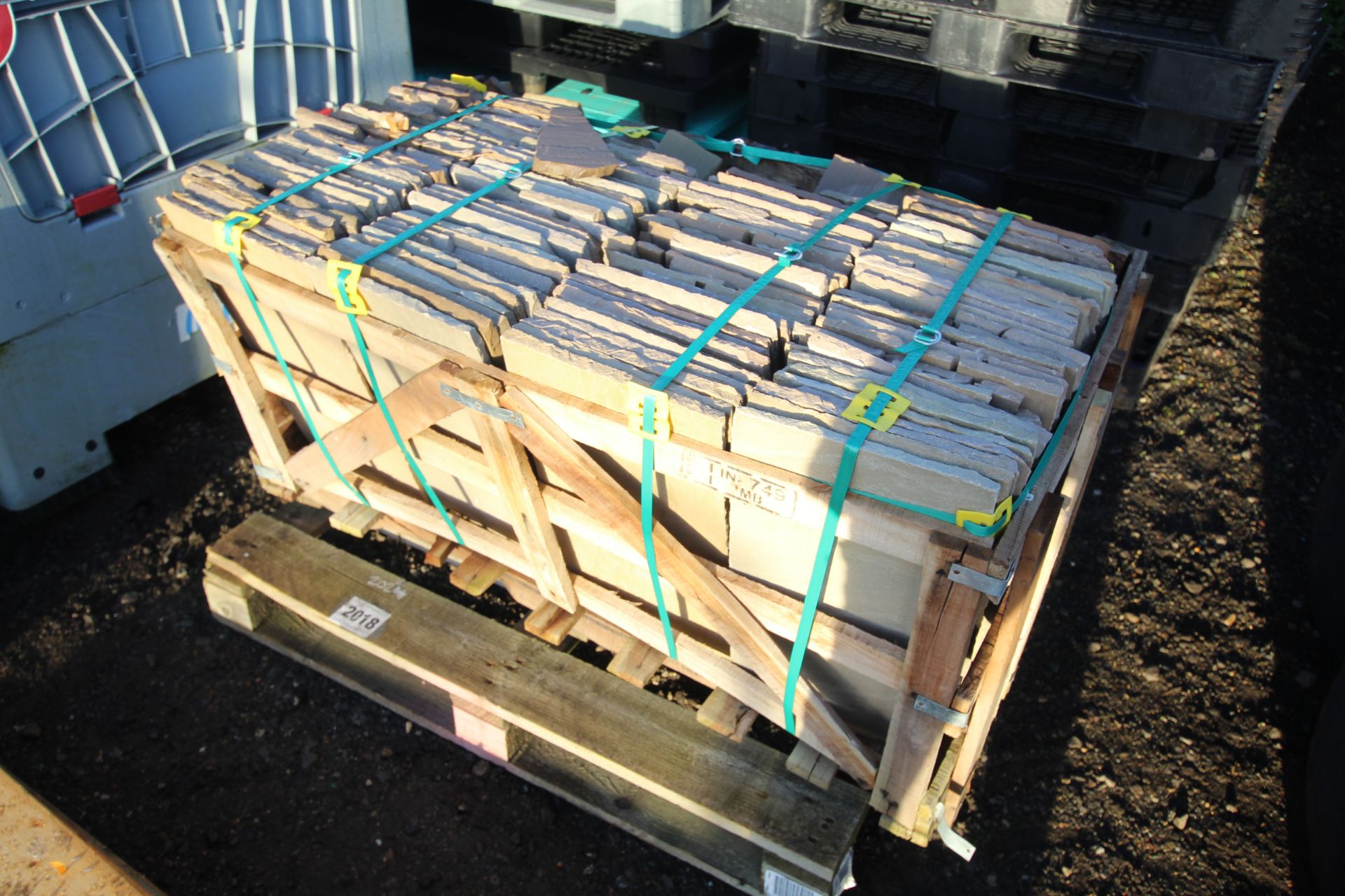 Damaged pallet of Indian Sandstone. V