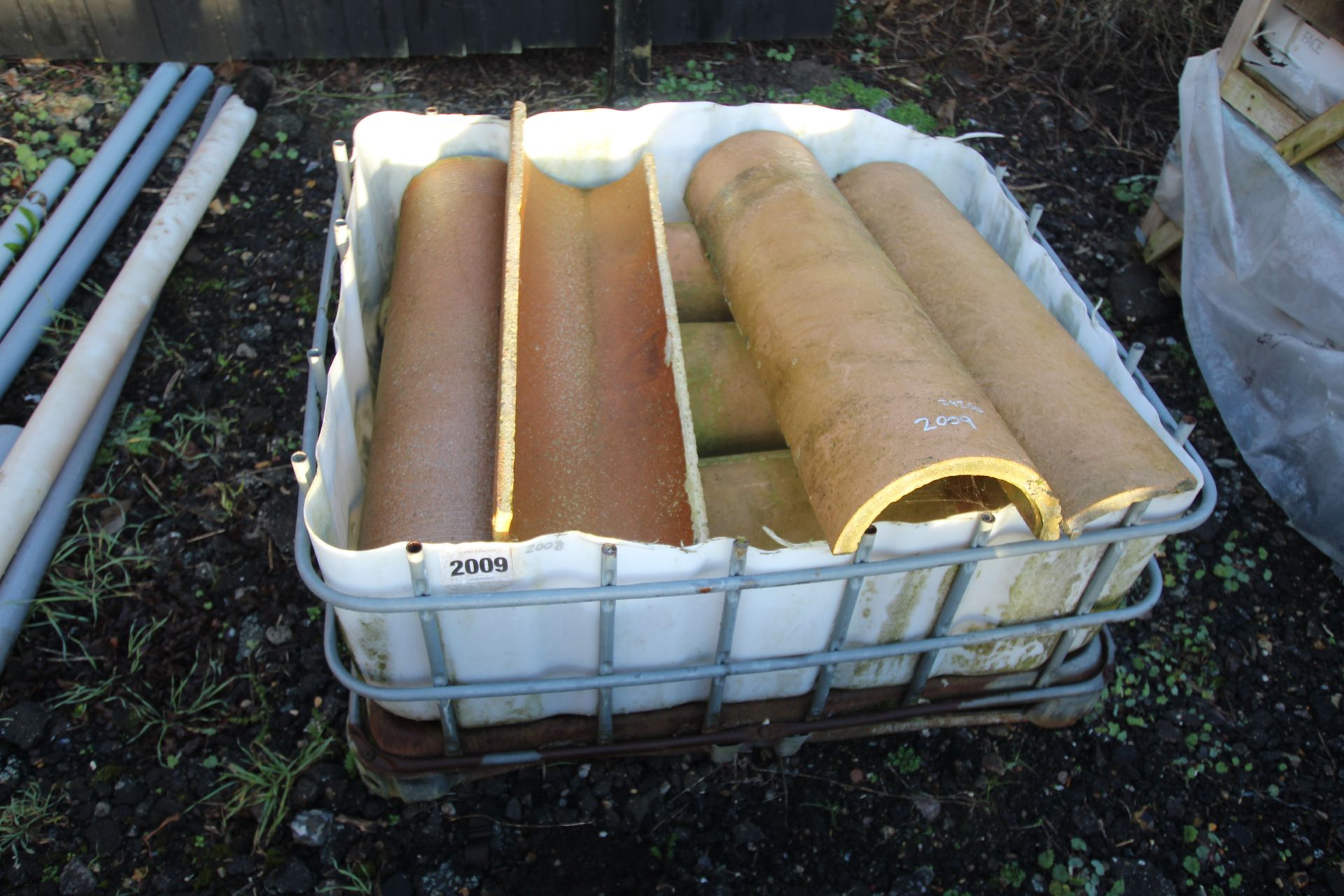 Quantity of salt glazed half pipes/ troughs.