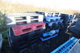 Quantity of plastic pallets.