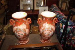 A pair of Japanese Kutani baluster vases