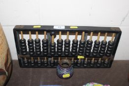 A Chinese baboo abacus and a Syrian enamelled balu