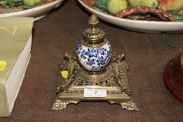 A 19th Century brass and ceramic ink stand