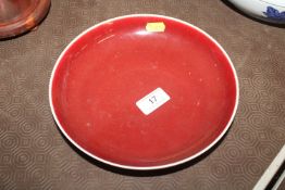 A Chinese Sang de Boeuf shallow dish with six char