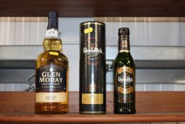 Glen Moray 1ltr bottle of single malt whisky and a bottle of Glenfiddich special reserve single malt