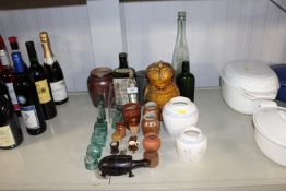 Two blue and white ginger jars, a quantity of old bottles, a pottery ornament of an owl, a miniature