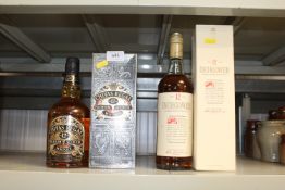 A bottle of Chivas Regal Premium Scotch Whisky tog