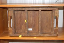 A wooden and metal brick mould