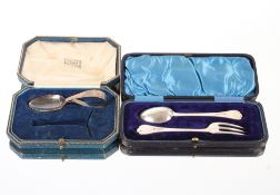 An Edwardian cased silver Christening fork and spoon, with Trefid ends, Sheffield 1904; and a silver
