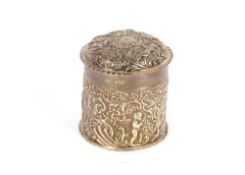A late Victorian silver cylindrical dressing table box and cover, by The Goldsmiths and Silversmiths
